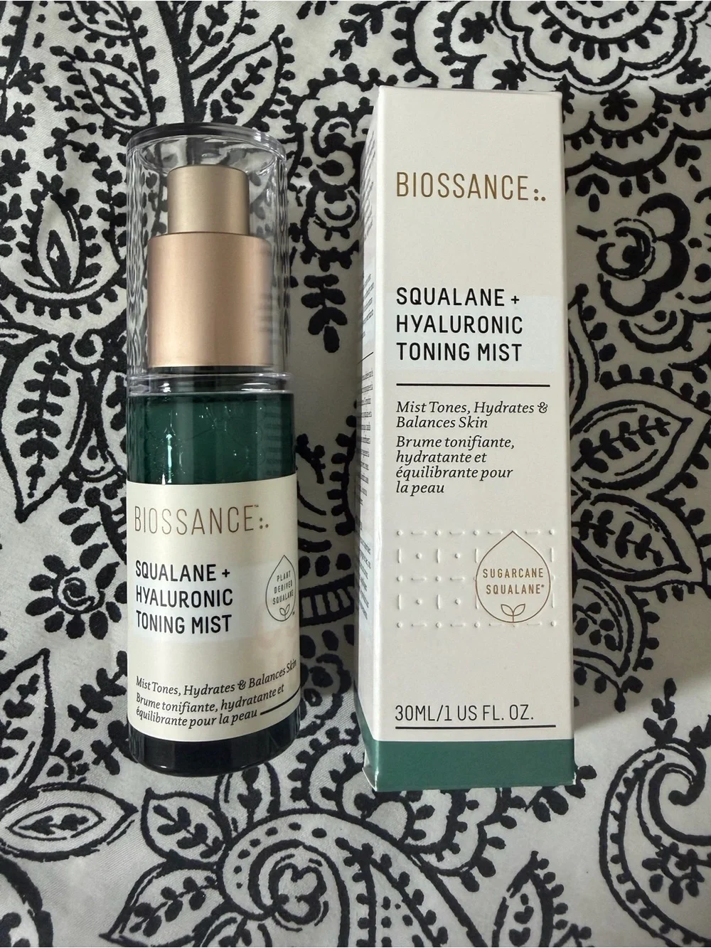 Biossance Toning Mist and pouch